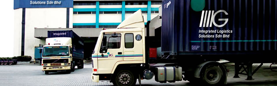 An ILS prime mover pulling a 40-foot ILS-branded container out of the warehouse yard